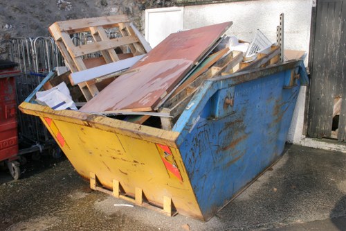 Professional team handling furniture disposal